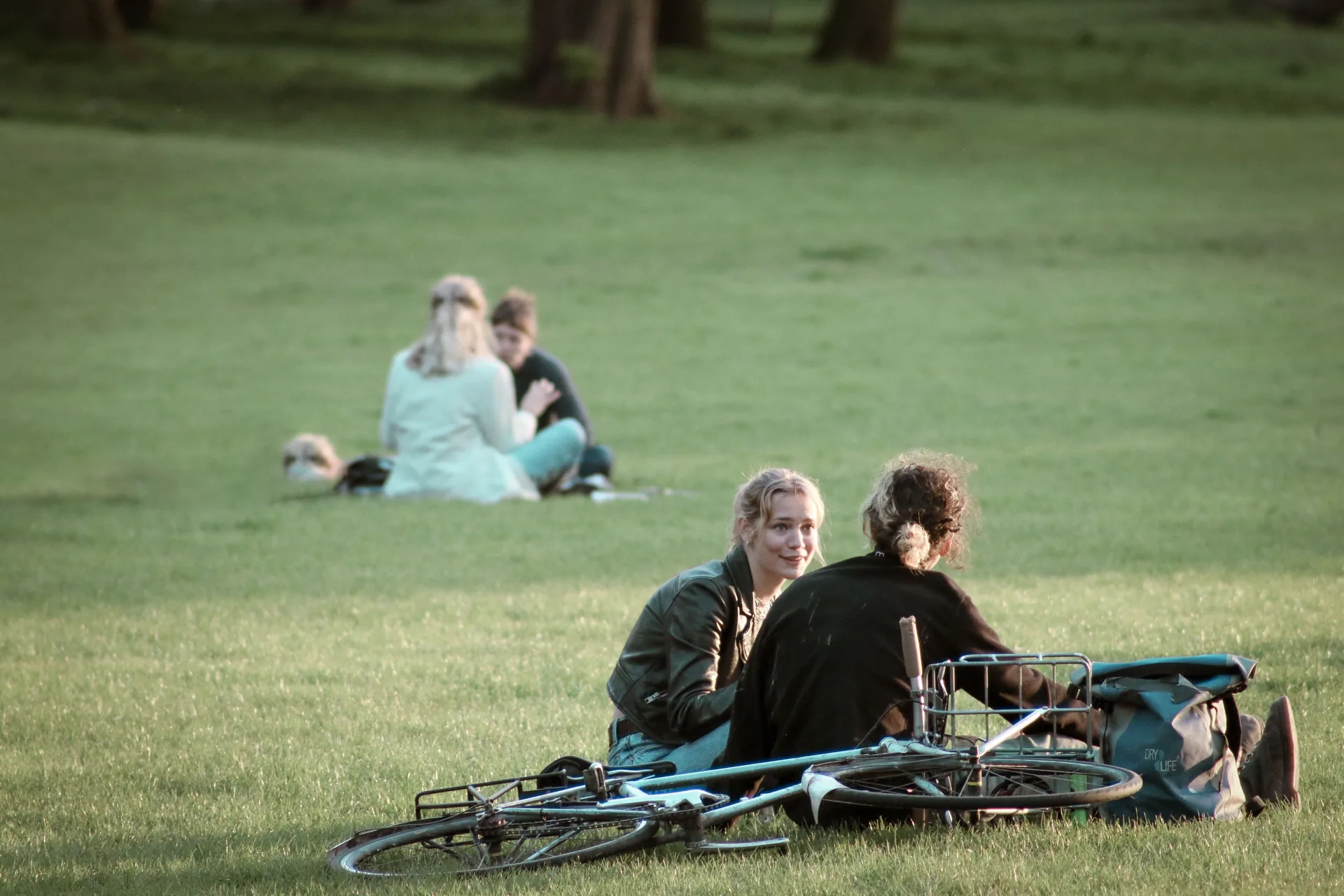 Two people sitting together in quiet conversation, representing free counselling support